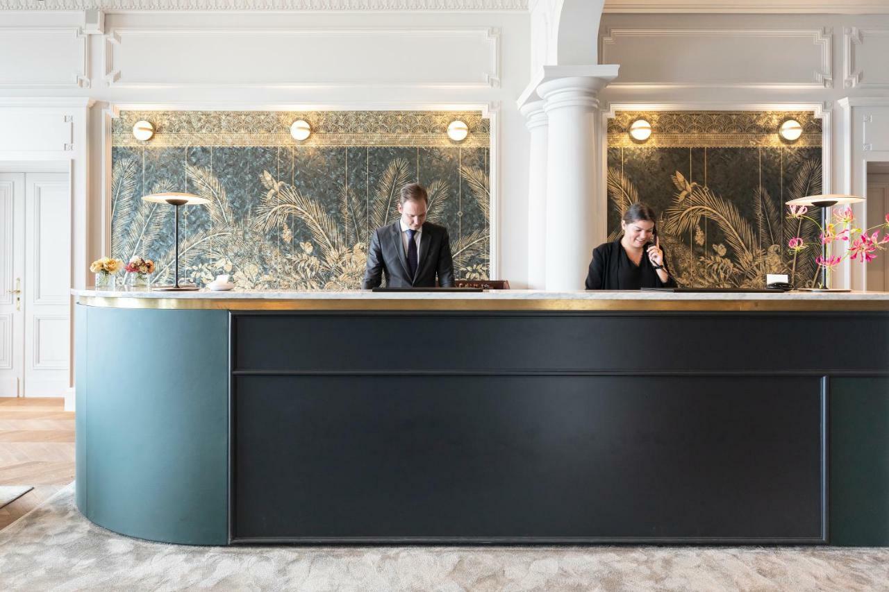 Le Palace De Menthon Eksteriør billede The hotel's reception